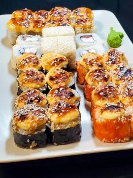 Bright sushi sets as background, top view, close-up Stock Photos
