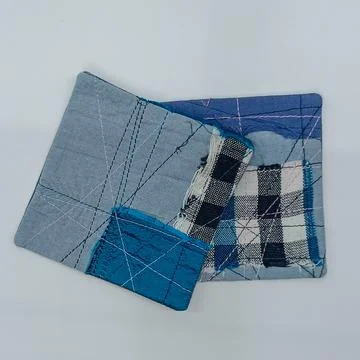 Bright textile patchwork composition close up.  库存照片