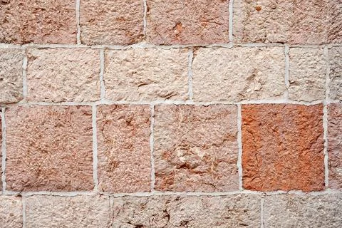 The bright texture of the old tiled wall with ceramic tiles Stock Photos