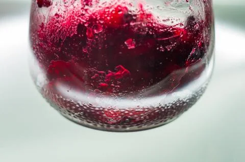 Bright translucent red currant jam in a glass jar Stock Photos