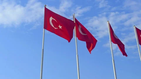 Bright Turkish Flags Waving in the Beautiful Cloudy Blue Sky Stock Footage 326009726