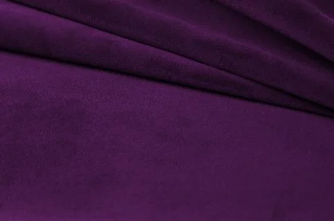 Bright ultraviolet velour textile sample. Fabric texture background Stock Photos