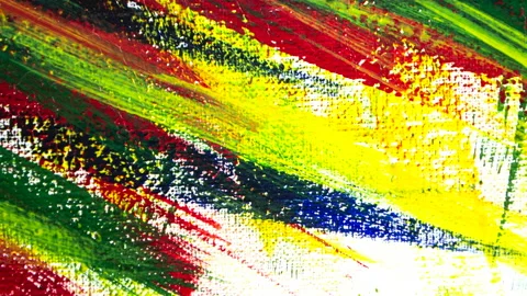 Bright variegated multicolored background of brush strokes with different paint Stock Footage 147743036