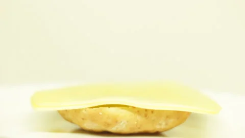 Bright video of a man making healthy vegetarian burger with cheese, tomatoe.. Stock Footage 233446031