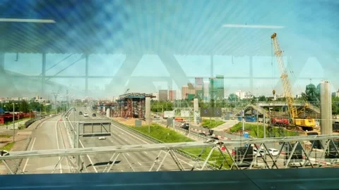 Bright view of new bridge cinstruction and highway with car on it on Moscow Stock Footage 136258582