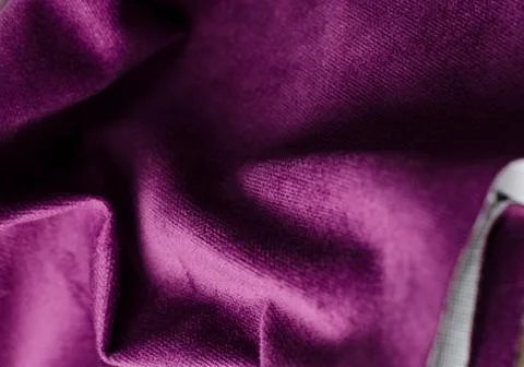 Bright violet velour textile sample. Fabric texture background Stock Photos
