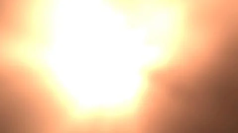 Bright, warm light flare effect with soft bokeh, perfect for creating a glowing, Illustrazione stock