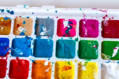 Bright watercolor paints on light background. watercolor background. bright w Stock Photos