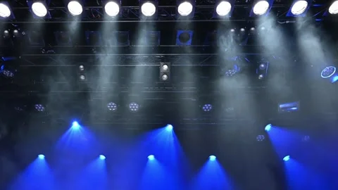 Bright white and blue ceiling spotlights lights the stage Video stock 258570485