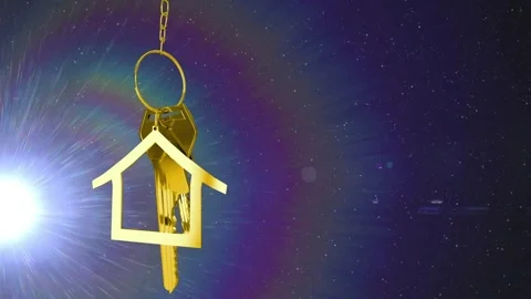 Bright white-blue flare appearing, gold house key pendant swinging gently to Stock Footage 329690967