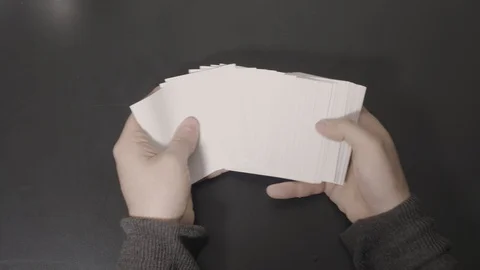 Bright White Cards Spread Across Desk Stock Footage 100558026
