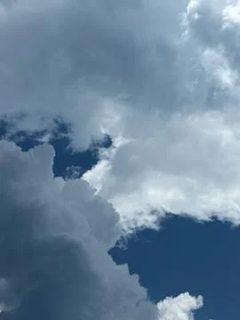 Bright White Cloud Edge and Blue Sky Close Up Фото