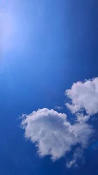 Bright White Clouds in Clear Blue Sky Stock Photos