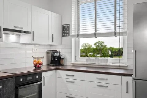 Bright White Kitchen with a View Stock Photos