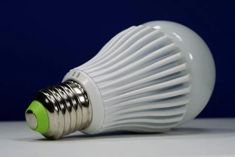Bright white LED lamp with E27 fitting casting soft light Stock Photos