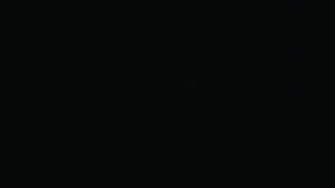 Bright White LED Light Flickering In Complete Darkness Stock Footage 329483967