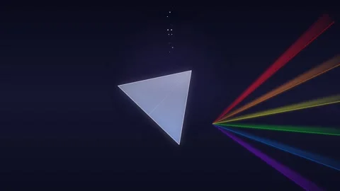 A bright white light beam passing through a glass prism creating a spectrum Stock-Footage 335118212