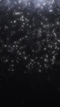 Bright white light particles floating in a dark night background Stock Illustration
