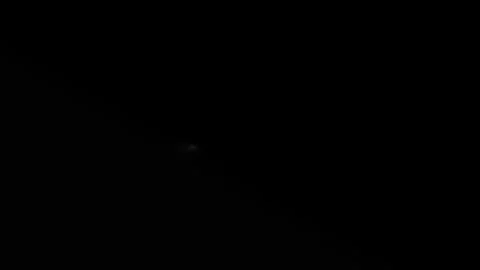 A bright white light shines in a triangular shape on the left. Stock Footage 315758334