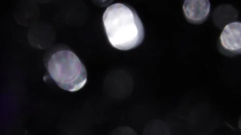 Bright white lights shine left and right in the darkness. Stockbeeldmateriaal 317451285