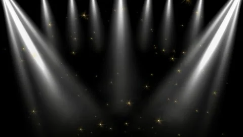 Bright White Spotlights Shining Down on Floating Golden Particles in a Dark Stock Footage 338368828