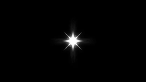 Bright white star light effect with glowing rays on a black background. Stock Footage 317692944