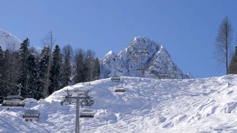 Bright winter landscape with snow covered peaks and trees Stock Footage 327921681