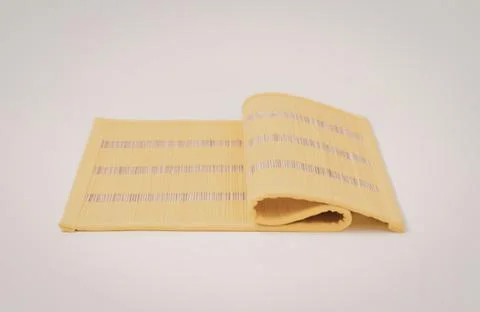 Bright yellow fabric with barcode pattern folded Stock Photos