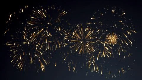 Bright Yellow Fireworks Exploding Against a Dark Night Sky Illustrazione stock