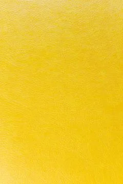 Bright yellow leather texture background with a natural pattern for design Фото