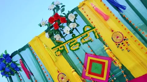 Bright Yellow Mehndi Function Decoration with Traditional Indian Wedding El.. Stock Footage 329384412