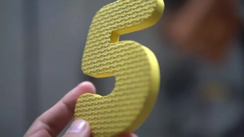 A bright yellow number five Stock Footage 300426942