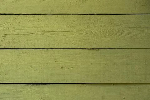 Bright yellow plank wall with a deep relief. rough surface texture Foto stock