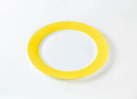 Bright yellow ring on plain background Stock Photos