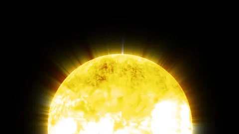 Bright yellow sun glowing against a dark black background with light rays a.. Stock Footage 337080252
