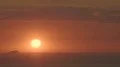 Bright yellow sun going down on horizon, beautiful sunset, endless seascape HD Footage