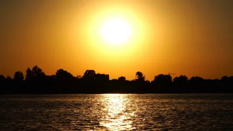 Bright yellow sun over the river Stock Footage 85362292