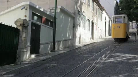 Bright Yellow Trams Passing At Tram At Elevador da Gloria Video stock 11485002
