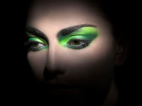 Bright_green_eyeshadow_close-up Stock Photos