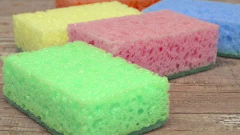 Brightly colored cleaning sponges designed for versatile home use to enhance 스톡 동영상 291422614