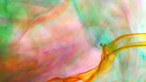 Brightly colored clouds of smoke dance. Hues of yellow, blue, green and red  Stock-Footage 247783683