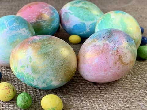 Brightly colored Easter eggs showcase unique patterns in pastel hues of blue, Stock Photos