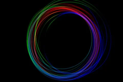 Brightly colored light patterns form a vibrant circle against a dark backgr.. Stock Illustration