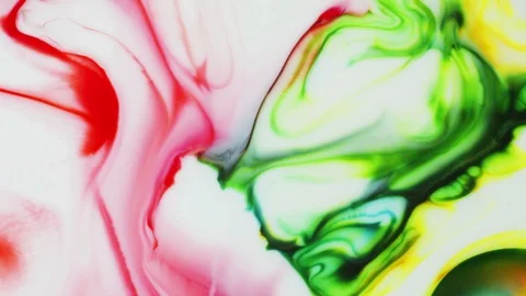 Brightly colored paints mingle Stock Footage 90190797