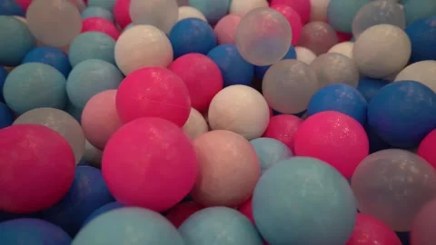 Brightly colored plastic balls in a ball pit at a children's playground. Stock Footage 296876775