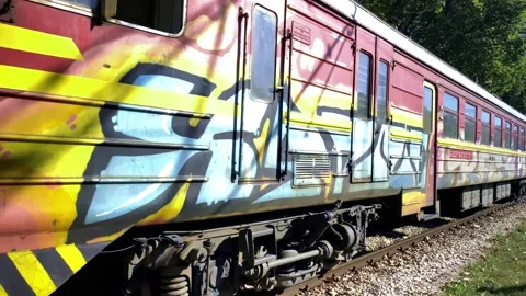 Brightly Colored Retro Train. Old locomotive with wagons. Colorful Retro Train. Stock Footage 149318911