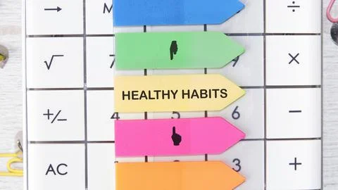 Brightly colored sticky notes display healthy habits written on them, emphasi Photos