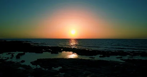 Brightly colored sunset over the calm Mediterranean Sea. Stock Footage 74172346