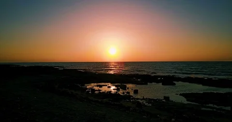 Brightly colored sunset over the calm Mediterranean Sea. Drone Point of View . Stock Footage 74173105
