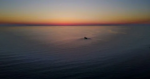 Brightly colored sunset over the calm Mediterranean Sea. Stock Footage 76645387
